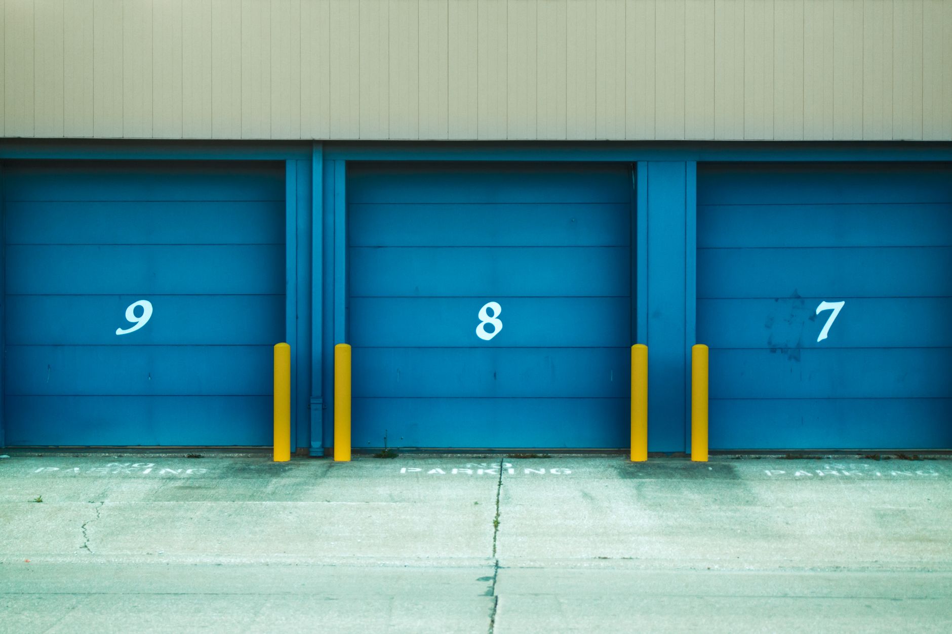 Row of roll-up storage unit doors